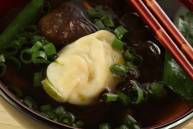Chinese wonton soup with dumplings and vegetables